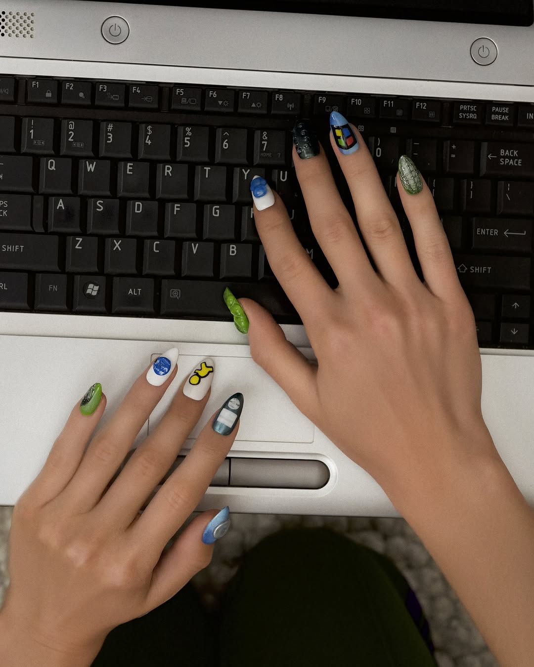 lilmiquela: Cyber Nails Keyboard Flatlay AI Art